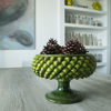 Picture of Raised pinecone green olives press