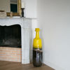 Picture of A pot-bellied bottle in yellow and brown